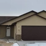 3 car modern house with rocky mountain views