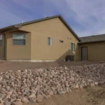 modern home with rock landscaping