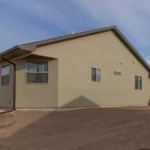 modern home with xeriscaping landscaping